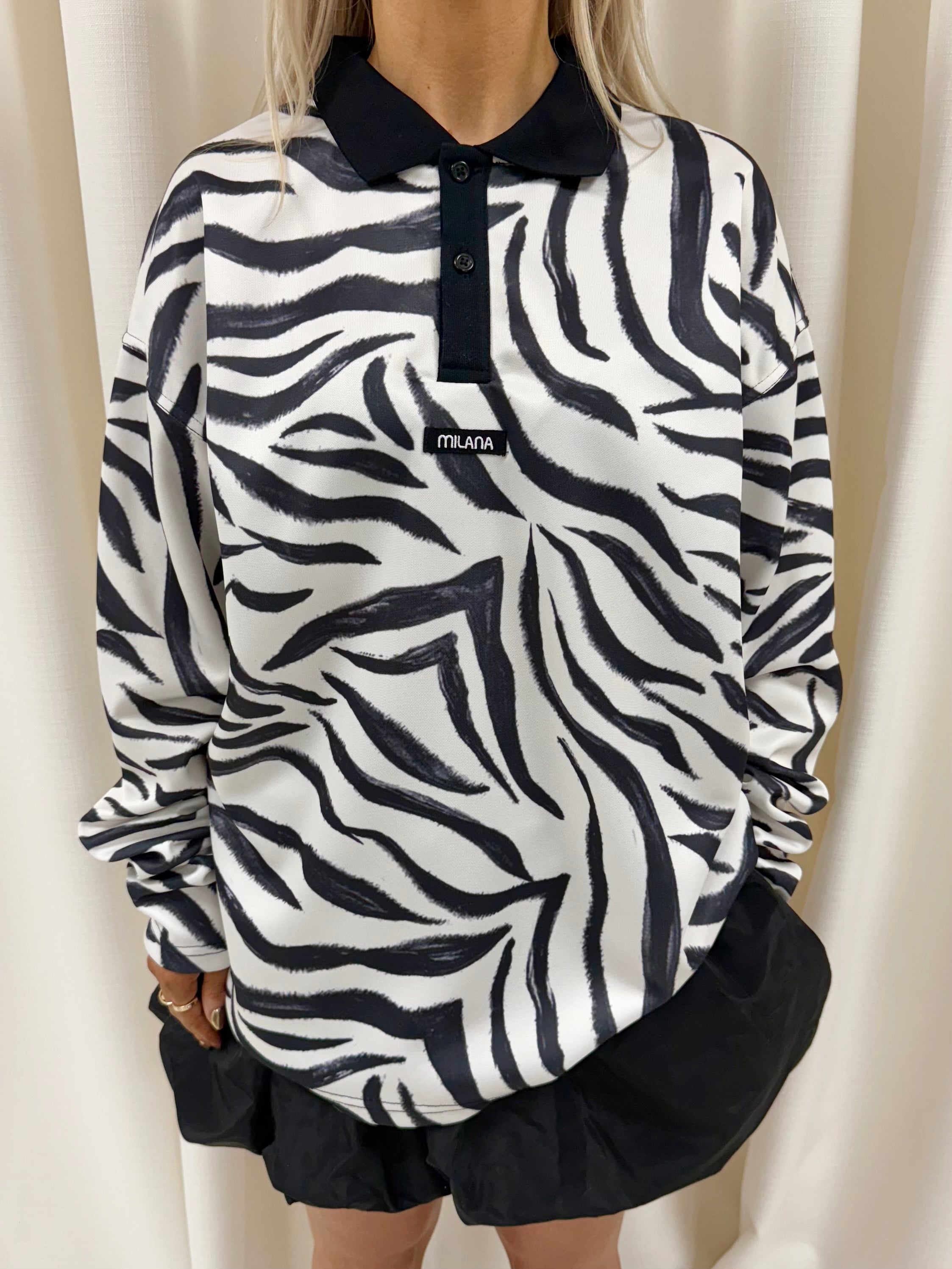 Zebra Print Long Sleeve Polo.