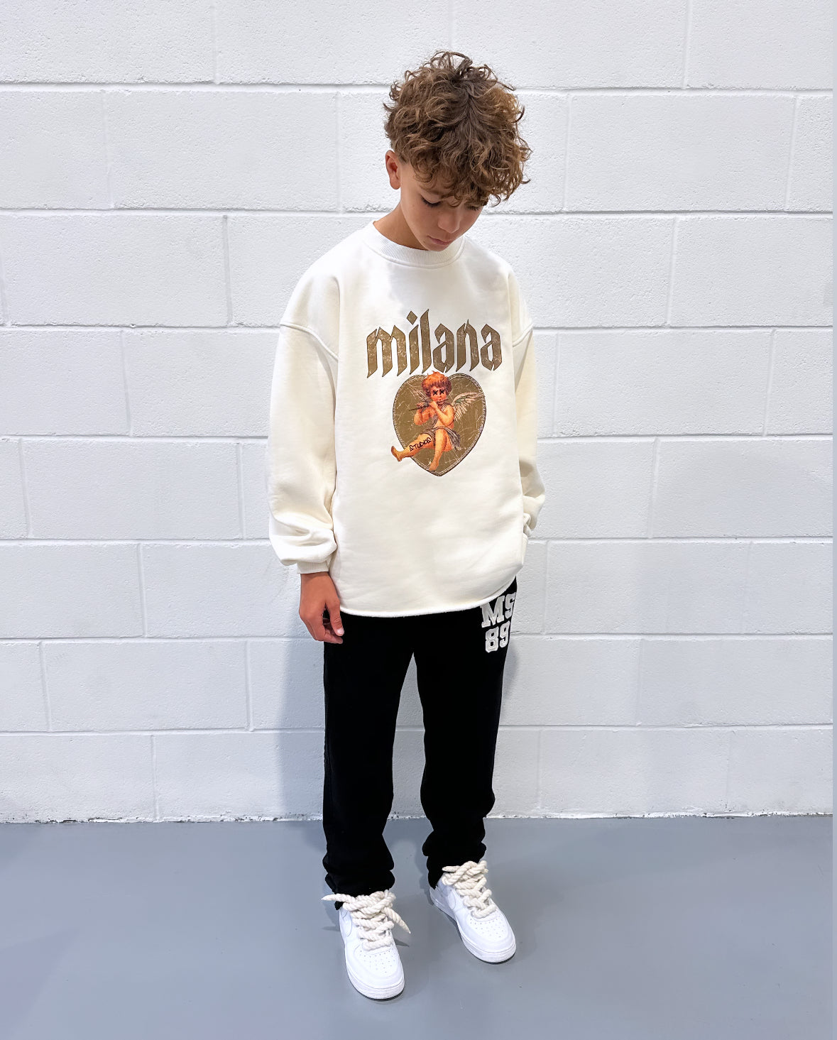 Cream Cherub Kids Open Hem Sweatshirt.