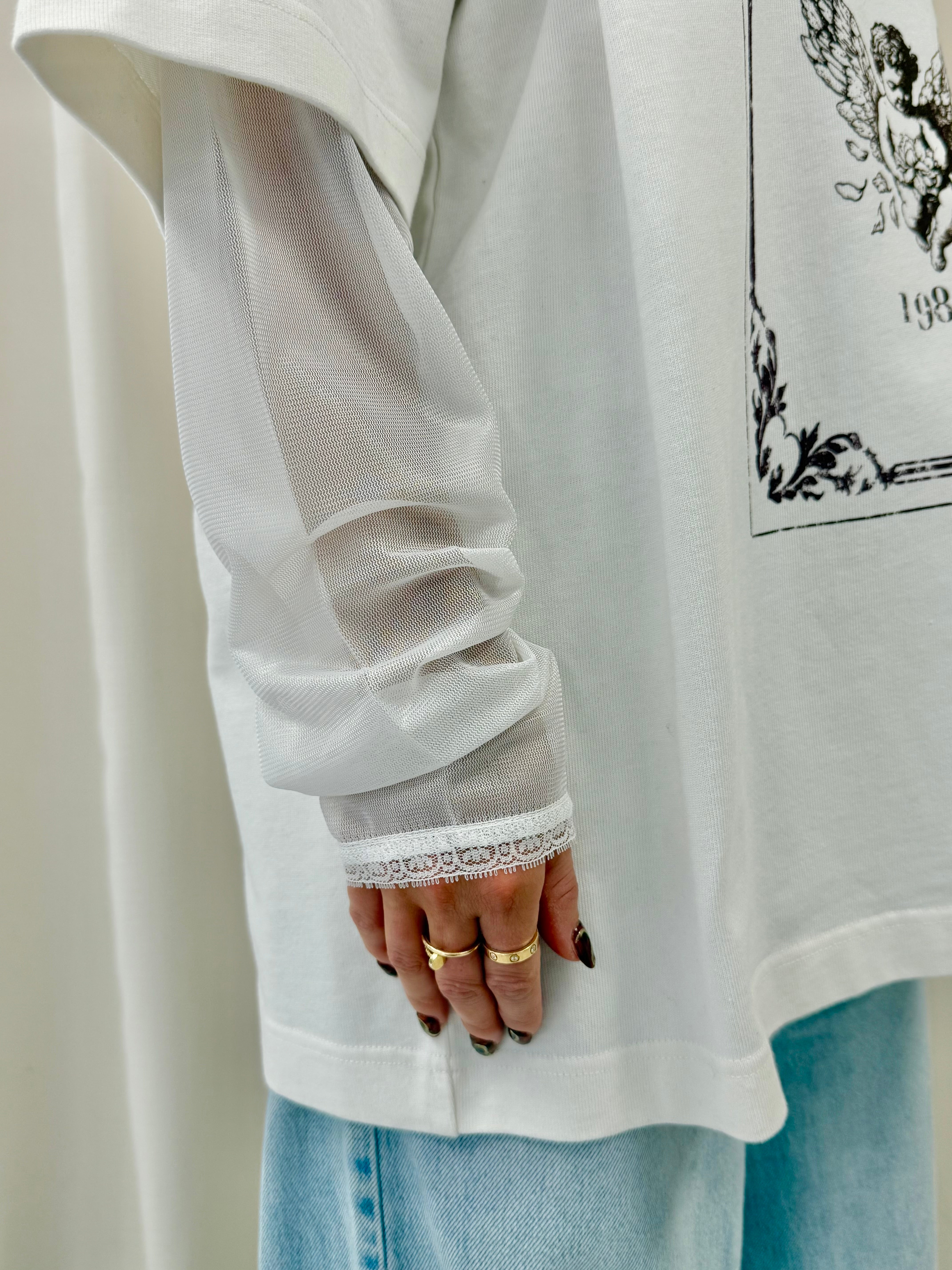 Off White Cherub Stamp Mesh Heavyweight Long Sleeve.