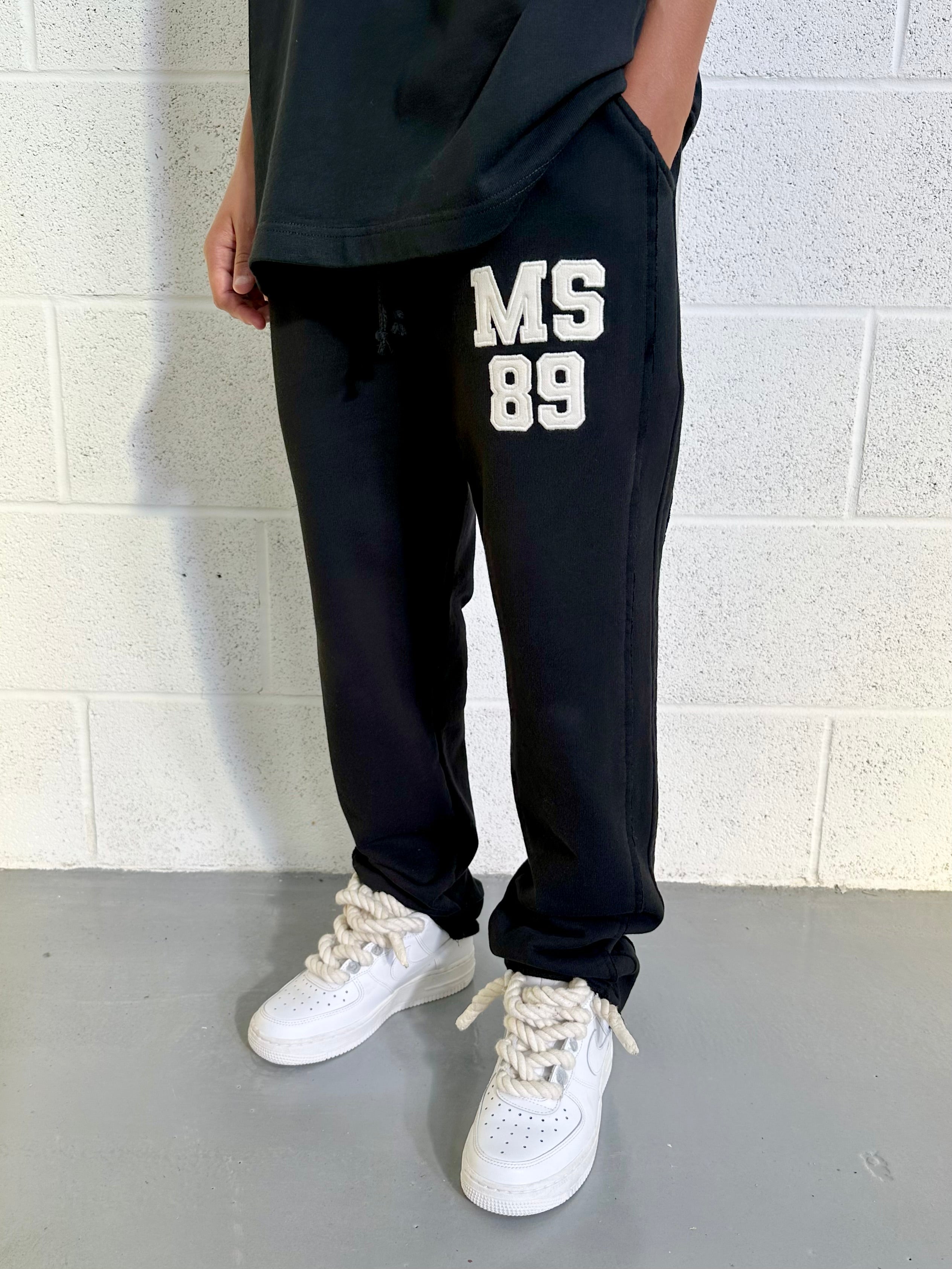 Black MS89 Relaxed Kids Sweatpants.