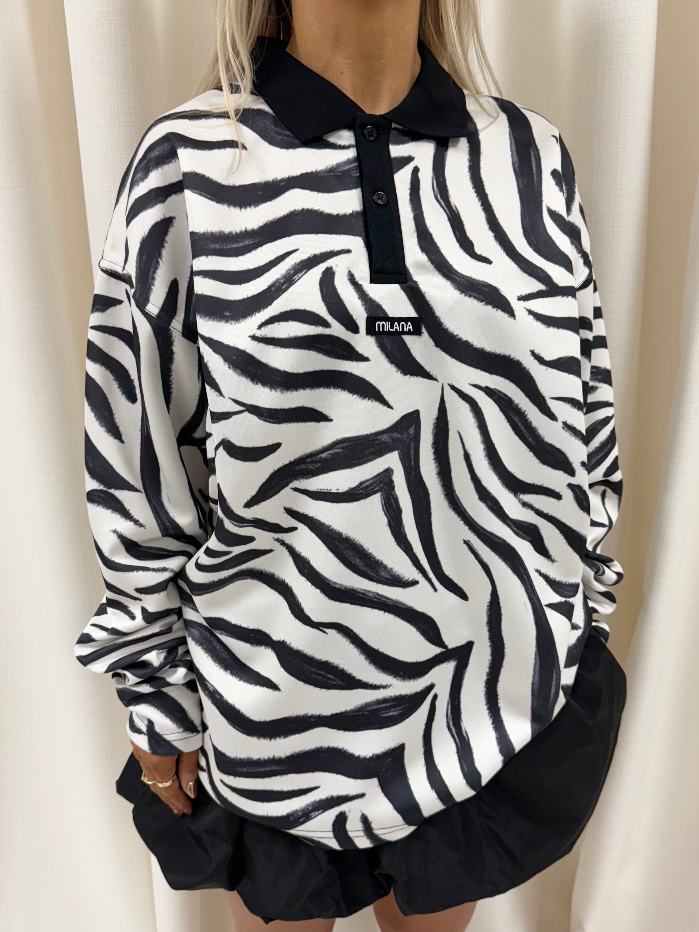 Zebra Print Long Sleeve Polo.