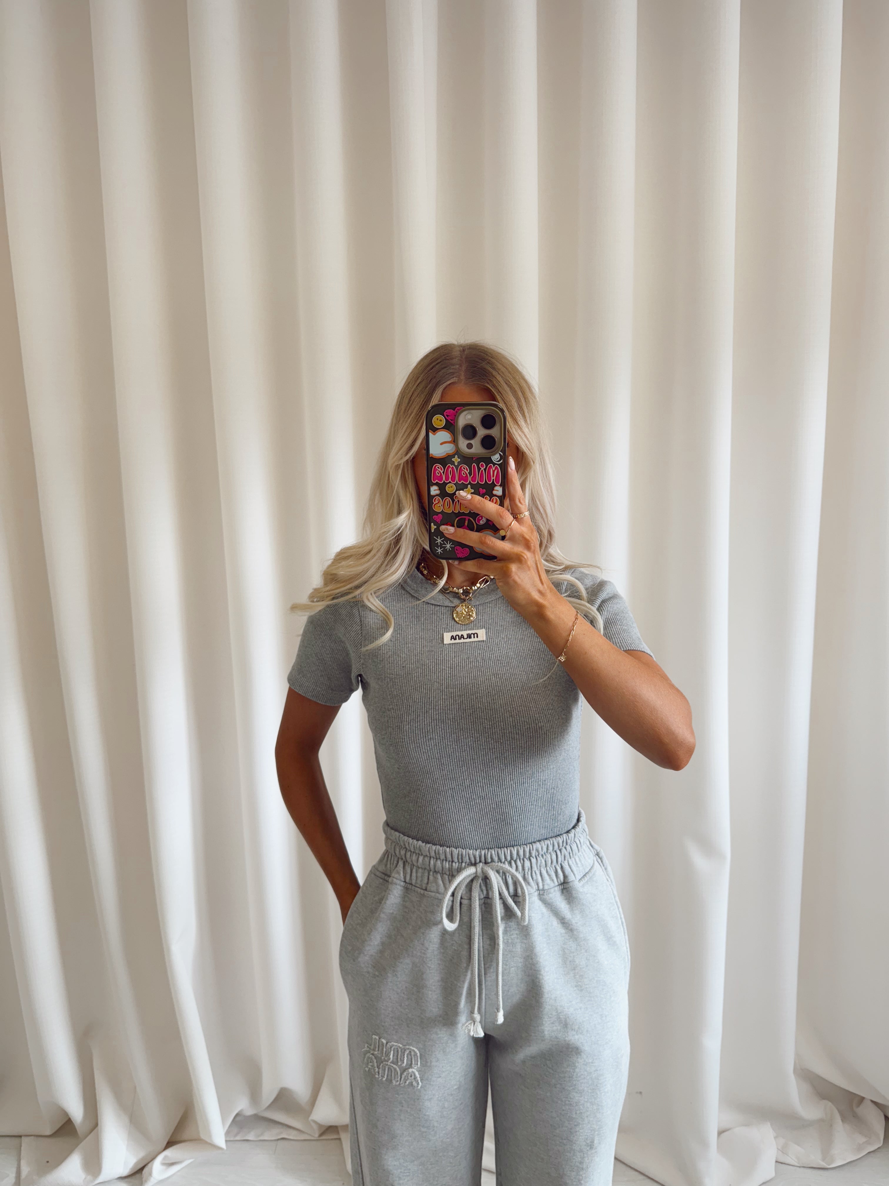 Mary Grey Core Ribbed Baby Tee.