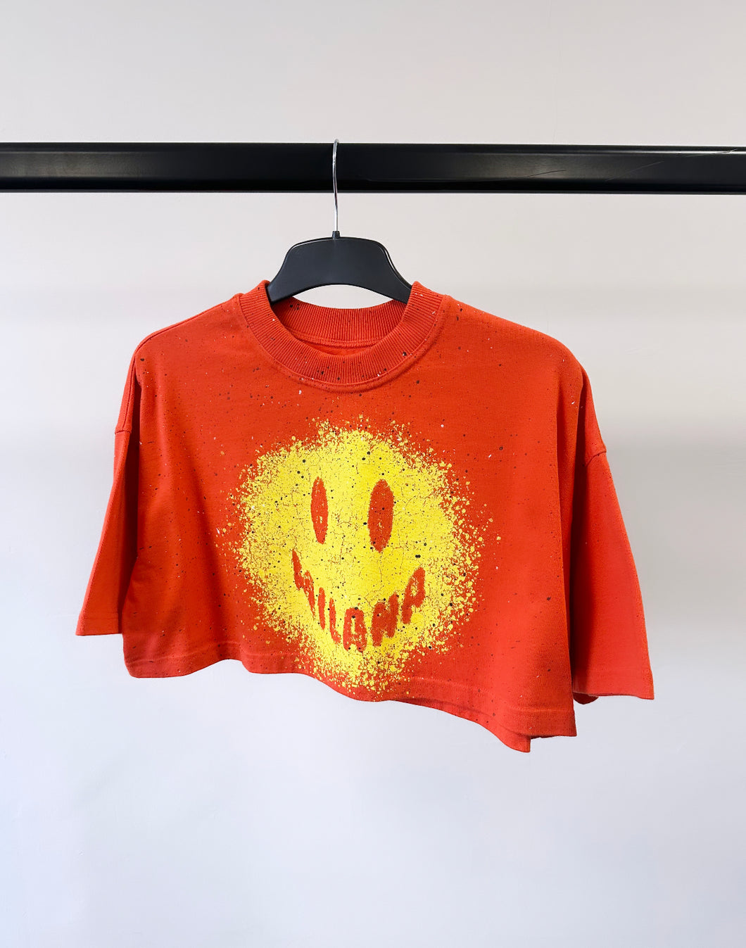 Red Splatter Smiley Cropped T-shirt.