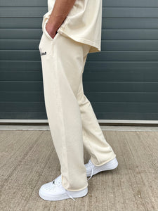 Cream Essential Relaxed Sweatpants.
