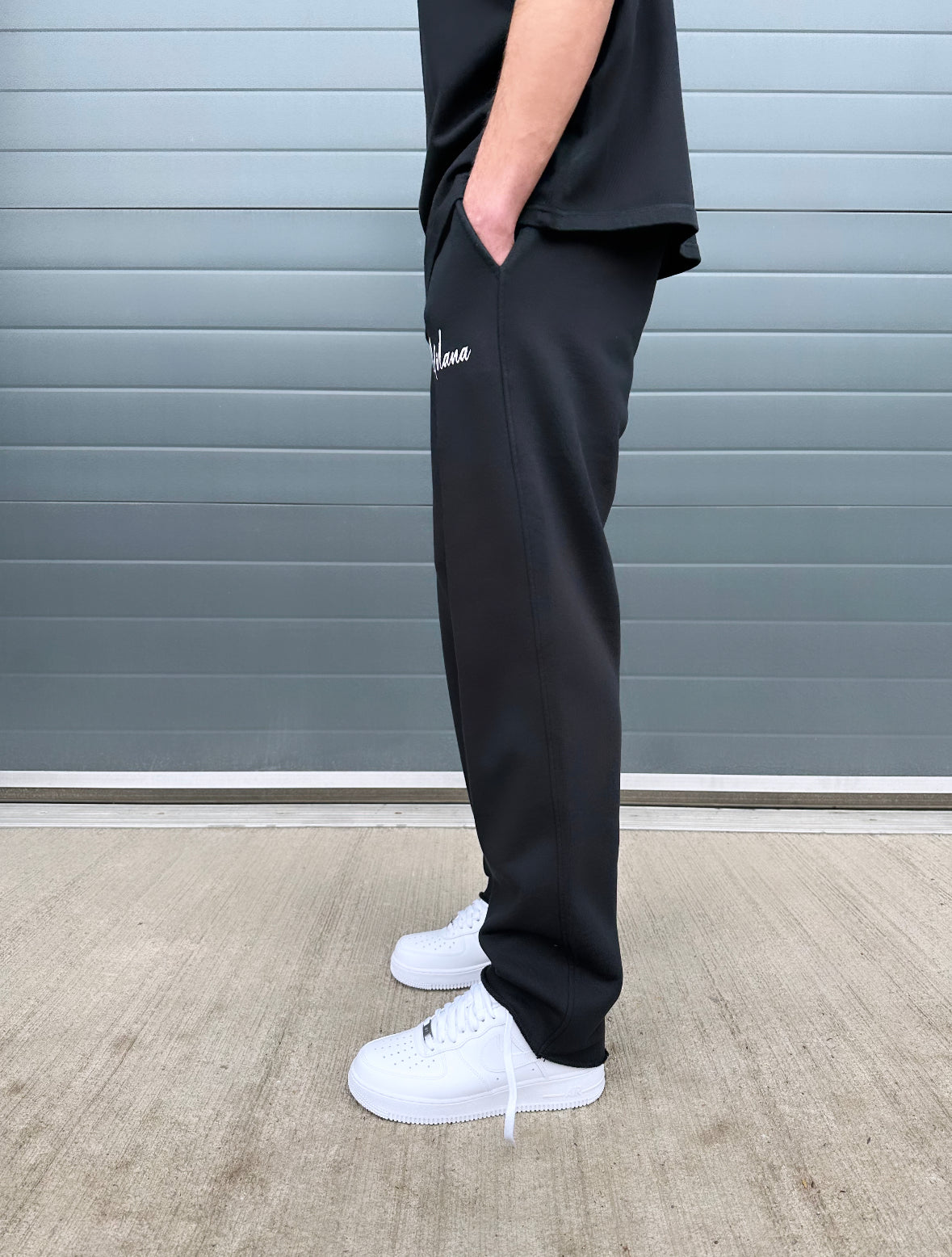 Black Essential Relaxed Sweatpants.