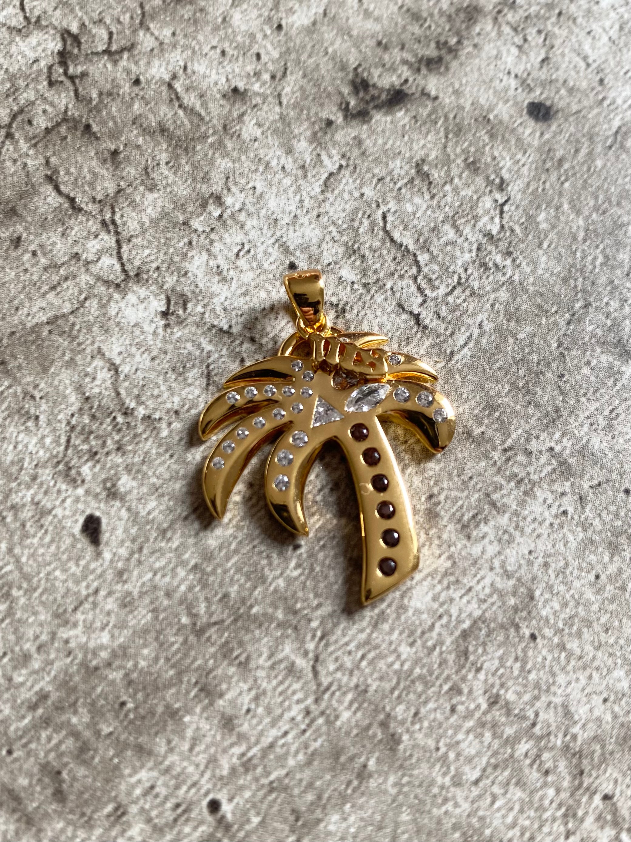 Gold Palm Tree pendant.